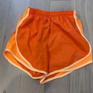 Nike orange running shorts size XS